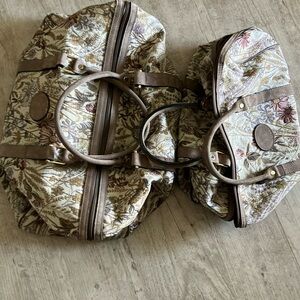 Large and small matching travel bags